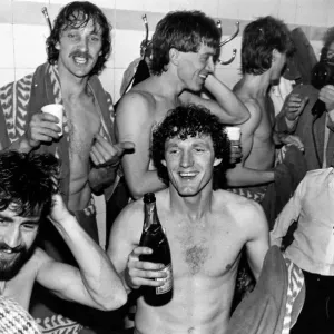 Champagne for the Villa players in the Arsenal dressing room after learning that they had Champagne for the Villa players in the Arsenal dressing room after learning that they had
