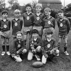 We are the champions... Scholes Junior and Infants School under-nine rugby team won We are the champions... Scholes Junior and Infants School under-nine rugby team won