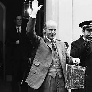 Chancellor of the Exchequer Anthony Barber waveas as he holds his red budget box