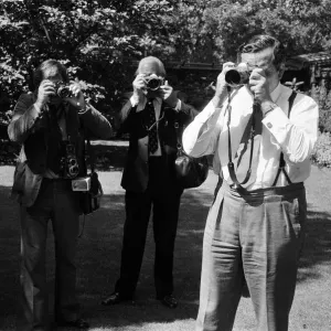 Chancellor Denis Healey with Photographers, 22nd July 1974 Print