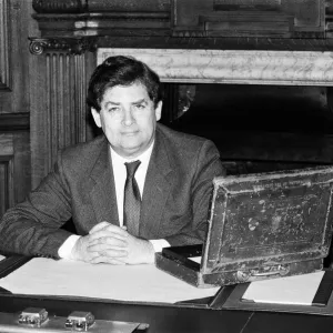Print of Nigel Lawson at his desk with the Budget case, 11th March 1986