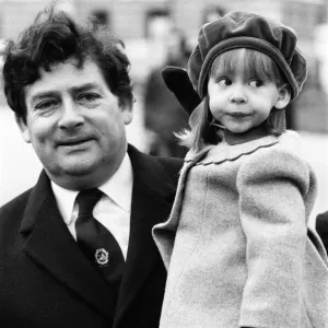 Chancellor of the Exchequer Nigel Lawson enjoys a pre-Budget walk with his family in St