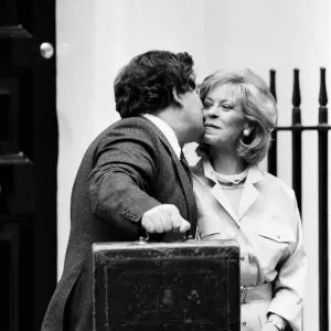 Chancellor of the Exchequer Nigel Lawson outside 11 Downing Street with his wife Therese