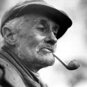 Print of an Old Man Smoking a Pipe