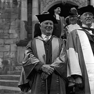 Charlie Chaplin in his cap and gown after being made a Doctor of Letters at Durham
