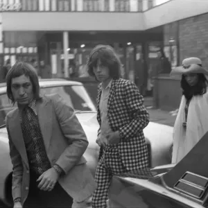 Charlie Watts, Mick Jagger and his girlfriend Bianca De Macias arrive at Coventry Theatre