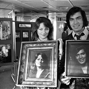 Charlotte Rampling and Engelbert Humperdinck with their portraits at a celebrity portrait
