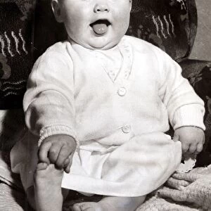 Cheeky little baby girl, circa 1950