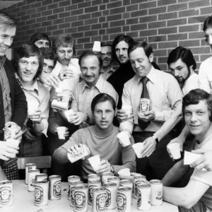 Cheers... team manager Gordon Milne acts as barman Cheers... team manager Gordon Milne acts as barman