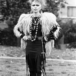 Chelsea fashion designer Jane Kahn models her designs. 2nd October 1983