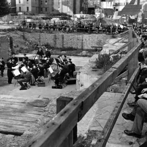 Chelsea holidays at home. London Transport Military Band playing on a bombed site Chelsea holidays at home. London Transport Military Band playing on a bombed site