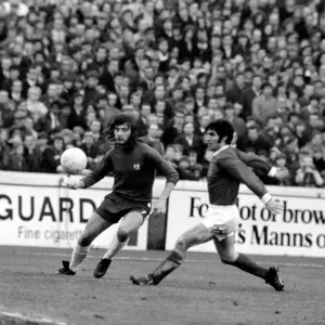 Chelsea v. Manchester United. Dunne of Manchester United beats long haired Hudson to Chelsea v. Manchester United. Dunne of Manchester United beats long haired Hudson to