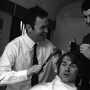 Chelseas manager Dave Sexton and centre forward Peter Osgood give Dave Webb a short
