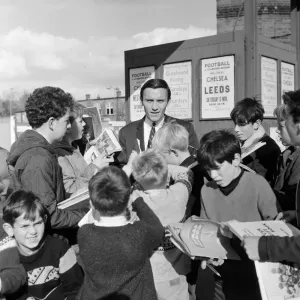 Chelseas transfer listed centre forward Barry Bridges surrounded by autograph Chelseas transfer listed centre forward Barry Bridges surrounded by autograph