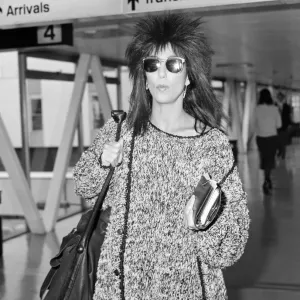 Cher, American actress and singer, Departures, London Heathrow Airport