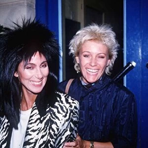 Cher singer actress and Angie Best after a meal in a Soho restaurant June 1985