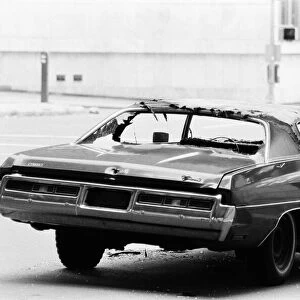 Chevrolet Nova, abandoned and vandalised on the streets of New York, USA, June 1984