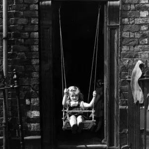 A Child Playing in a Doorway Print, 24th July 1964