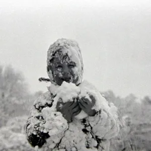 Child playing in the snow after a heavy fall at Hampstead Heath January 1945