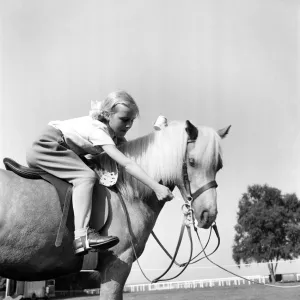 Children: Animals. Welsh Pony gets reward. 6 year old Mary Peddie of Tring sharing her Children: Animals. Welsh Pony gets reward. 6 year old Mary Peddie of Tring sharing her