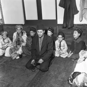 Children attend the Peel Street Mosque in Tiger Bay, Cardiff. 1st March 1954