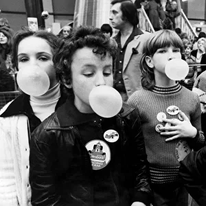 Children blowing bubble gum at Alexandra Palace. 11th March 1979
