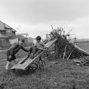 Children building a bonfire on Teesside. 1971