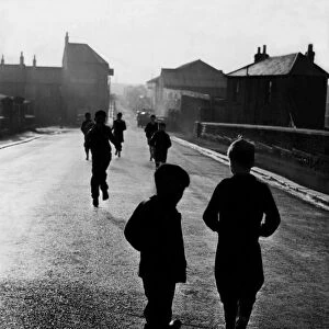 Children in Cardiffs dockland spin-out those last blissful moments before its time