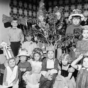 Children compete in a Fancy Hat Competition, Teesside, North East England, January 1974
