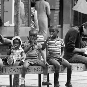 Children eating ice creams in Coventrys Precinct shopping centre Children eating ice creams in Coventrys Precinct shopping centre