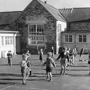 Children enjoy the playtime with skipping and hula hoops at Waterhouses School