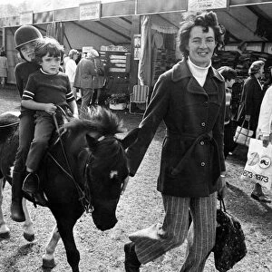 Children enjoy a pony ride in Southport. Circa 1973