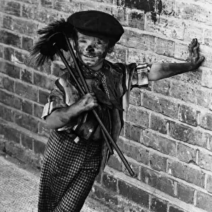 Children: Fancy Dress: Mucked up... four-year-old chimney sweep Tommy Stafford