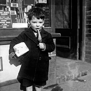 Children - Food - 1940s Young Boy standing outside a shop