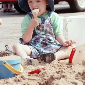 Children from Kids & Co. Nursery spend the morning playing with the sand in Children from Kids & Co. Nursery spend the morning playing with the sand in