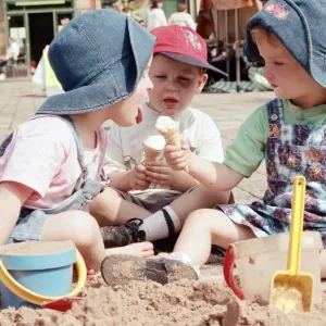 Children from Kids & Co. Nursery spend the morning playing with the sand in Children from Kids & Co. Nursery spend the morning playing with the sand in