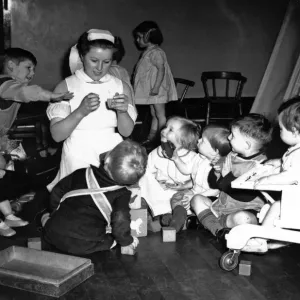 Children in nursery while their mothers work during World War II. Circa 1941 Children in nursery while their mothers work during World War II. Circa 1941