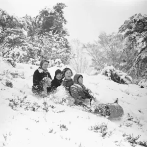 Children at Oxshott enjoying the winter snow. January 1939 Children at Oxshott enjoying the winter snow. January 1939