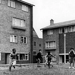 Children playing in Hodges Square, Butetown, Cardiff. 25th August 1961