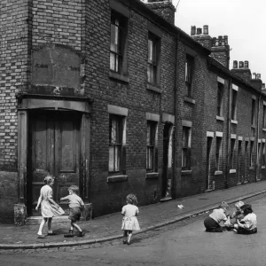 Children playing on the roadside at the corner of Loftus Street in Hanley Children playing on the roadside at the corner of Loftus Street in Hanley
