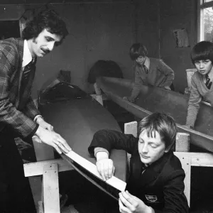 Print of Children Building a Canoe in Wood Shop Class, Middlesbrough, 1976 Print of Children Building a Canoe in Wood Shop Class, Middlesbrough, 1976