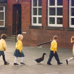 Children with their school mascot, Esmerelda the duck