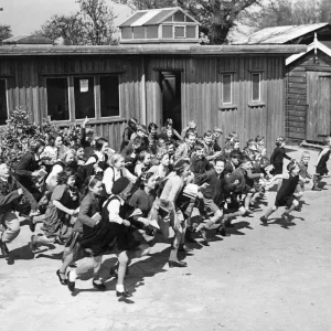 Children at school on the South East Coast of England, rush to their school shelter Children at school on the South East Coast of England, rush to their school shelter