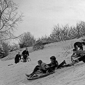 Children sledging in Stoke Park, Bristol 31st December 1961
