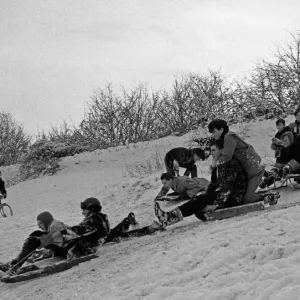 Print of children sledging in Stoke Park, Bristol on New Year's Eve 1961 Print of children sledging in Stoke Park, Bristol on New Year's Eve 1961