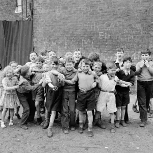 Children of the tenement blocks of Govan, Glasgow seen here posing for the camera