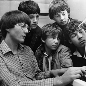 Children using computers. Computer crazy schoolboys Andy Stoneman, Luke Youll, John Shaw