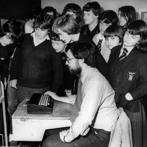 Children using computers. The mother of one of the pupils at Benfield Road School Children using computers. The mother of one of the pupils at Benfield Road School