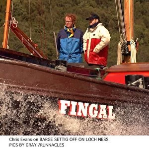 Chris Evans Radio one dj and tv presenter on a barge with a unknown male on Loch Ness
