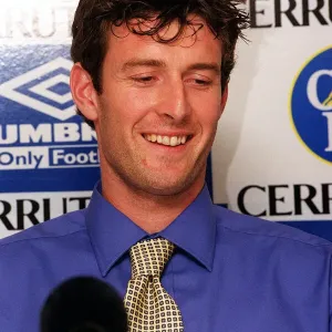 Chris Sutton, poses for the media during news press conference at Stamford Bridge after Chris Sutton, poses for the media during news press conference at Stamford Bridge after